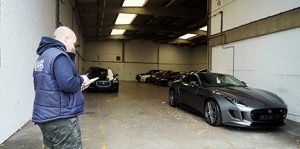 Pest technician writing a report for commercial property